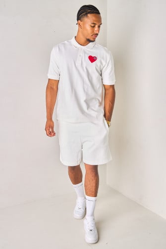 Polo blanc à empiècement cœur