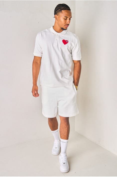 Polo blanc à empiècement cœur